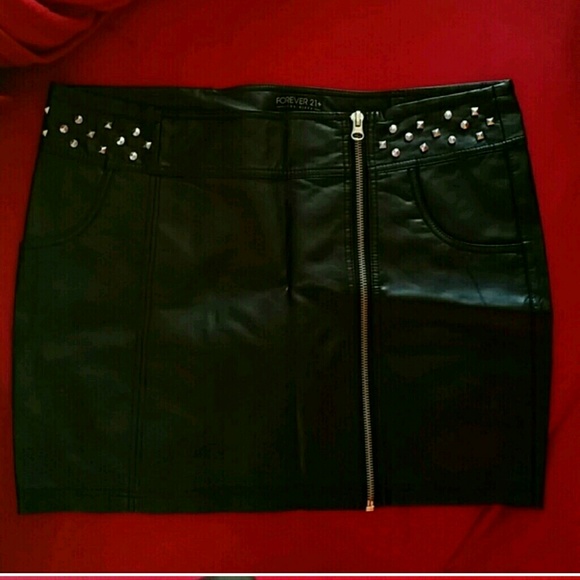Faux leather mini skirt with studding