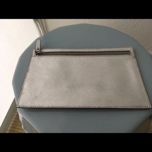 Ann Taylor clutch has zipper on both sides