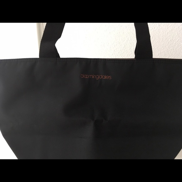 Bloomingdale's black bag with polka dot interior
