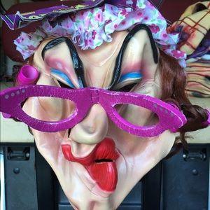 House lady in rollers rubber face mask