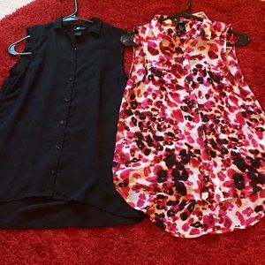 Two sleeveless button up blouses.