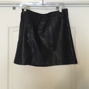 Mini, black leather skirt.