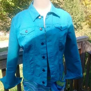 Turquoise jean jacket.
