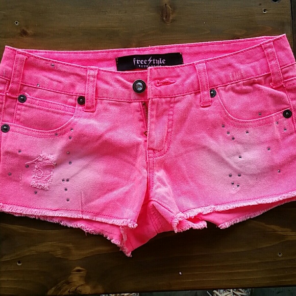 Bright pink denim shorts