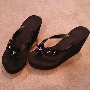 Black BCBGeneration platform flip flops