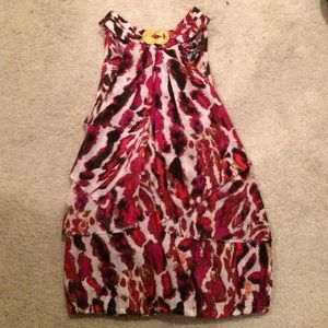 A high neck cheetah print tank top blouse