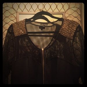 Peplum top with shoulder detail