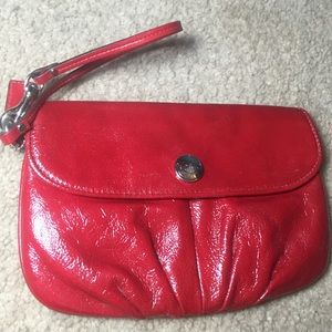 Red leather Coach Wristlet