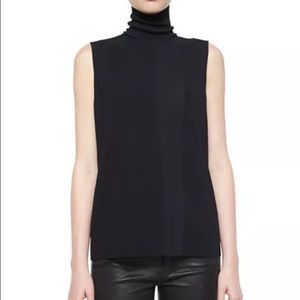 Laser cut sleeveless turtleneck
