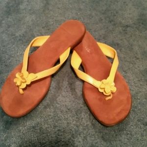 Yellow flower sandals.