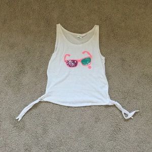 A KID SIZED white sunglasses shirt