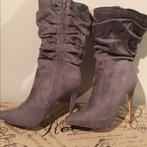 Brand new women's heeled boots - size 10