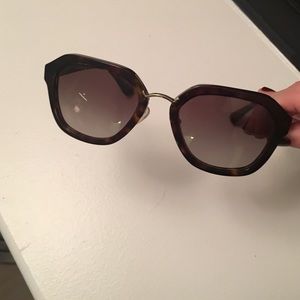 Prada sunglasses: Never worn