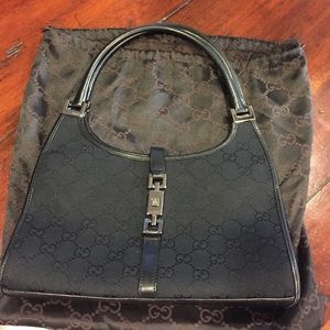 Black canvas Gucci bag