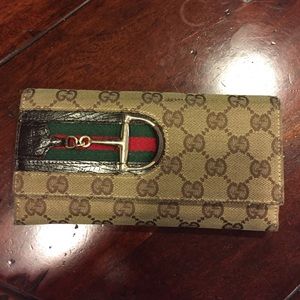 Brown Gucci wallet