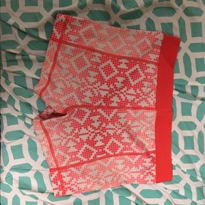 Pink patterned Nike Pros