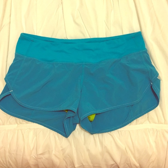 Blue Lululemon 4-way run-time shorts. Size 8