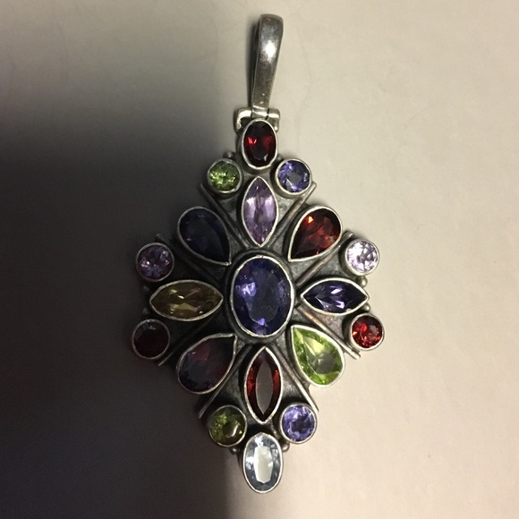 Vintage pendant with different stone.
