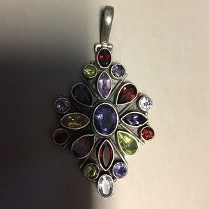 Vintage pendant with different stone.