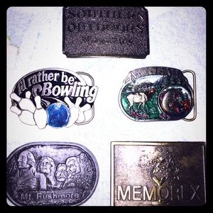 A bundle of buckles. '79-'85. Heavy brass.