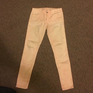 Light pink distressed jeans