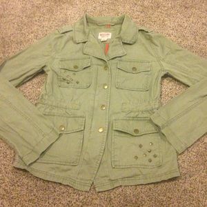 Long sleeve, olive green jacket with bronze studs.