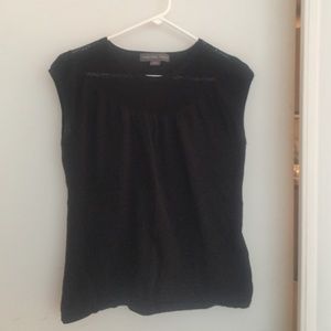 Black sleeveless top with crochet neck detail
