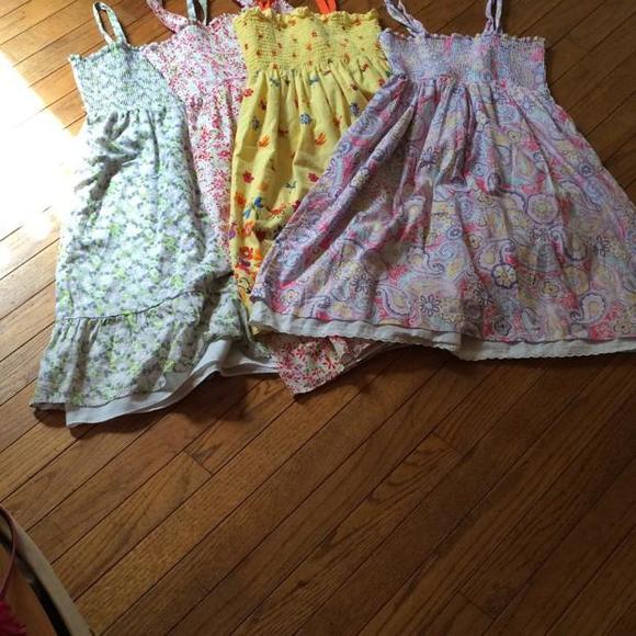 4 elastic top sundresses.  Sizes 12-14 cute patterns