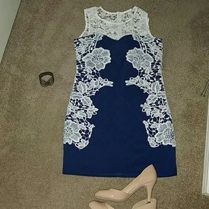 Navy blue dress with white lace accents