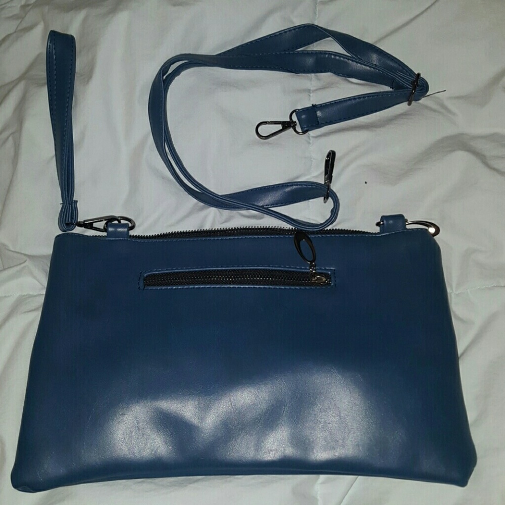 ***DONATED Edgy skull embossed purse. Never used! - Picture 4 of 4