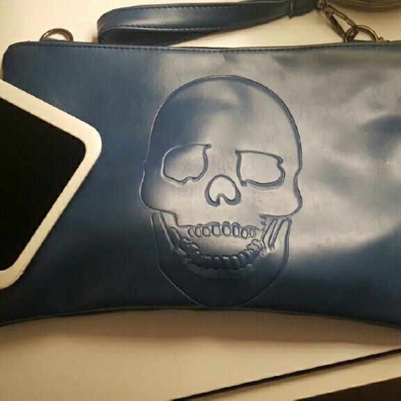 Handbags - ***DONATED Edgy skull embossed purse. Never used!