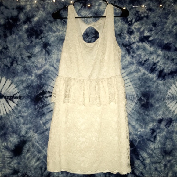 Ivory peplum lace dress