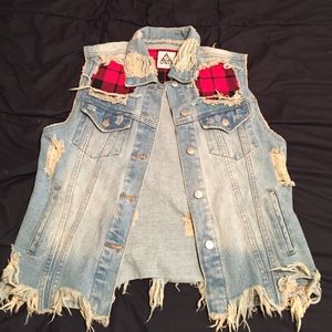 Destroyed Denim vest with flannel cutouts