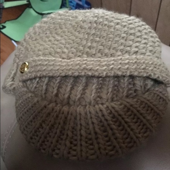 Michael Kors tan hat worn once great condition