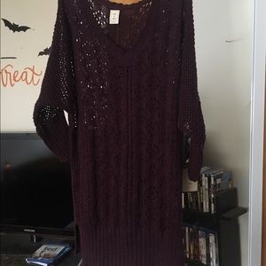 Purple long knitted sweater.