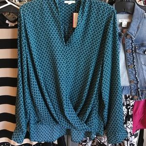 Teal and navy long sleeve blouse.