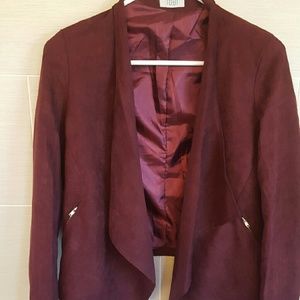 Burgundy jacket.