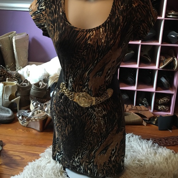 Animal print body conscious dress and belt.