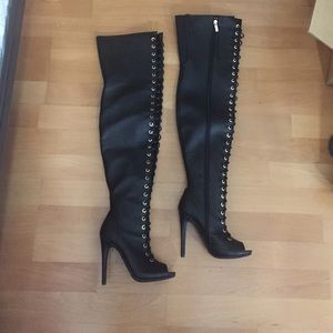 Black faux leather lace up thigh high boots
