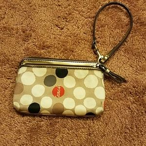 Authentic coach wristlet/ phone Holder