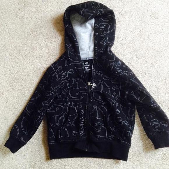 Black jacket with dinosaurs