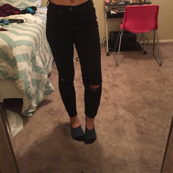High waisted black ripped knee skinny jeans
