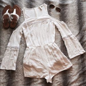 White romper w/shoulder cutouts and bell sleeves