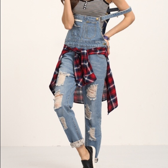 Ripped light wash denim overalls