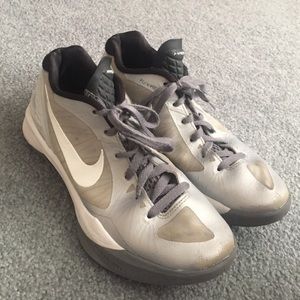 Silver/white nike volleyball shoes