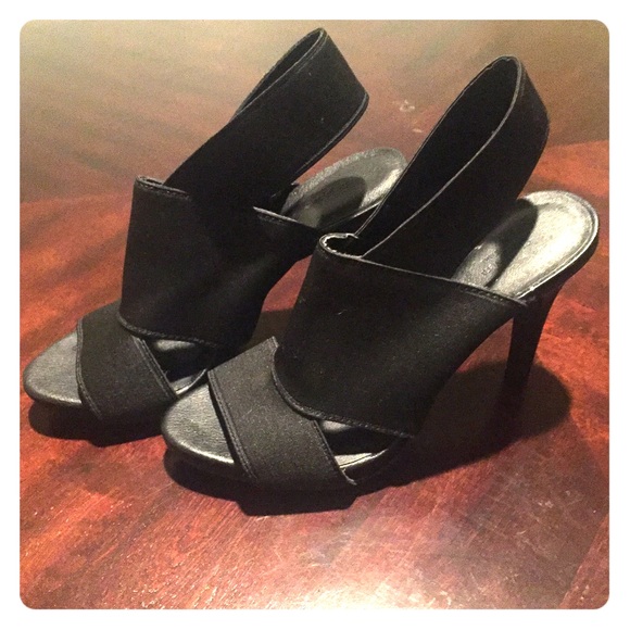 Vera Wang Black open toe heels.