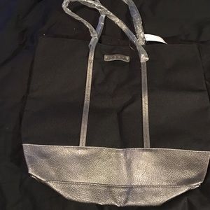 Black tote with silver bottom