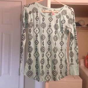 A blue and black shirt .