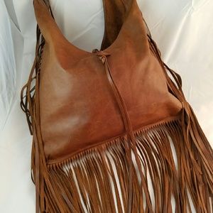 Leather shoulder bag with fringe