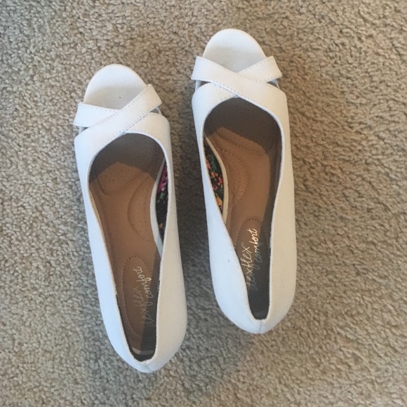 White two inch wedges that have never been worn.
